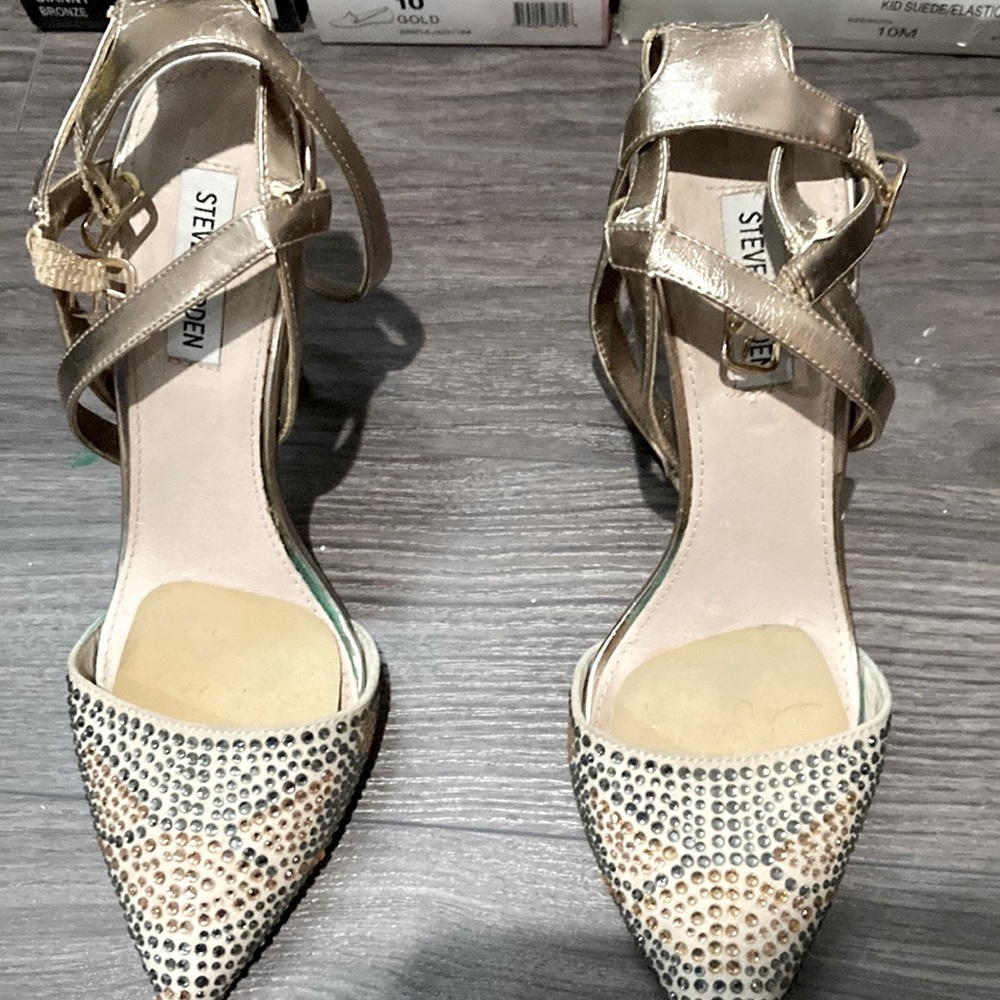 Stylish heels with blue and gold rhinestone accent